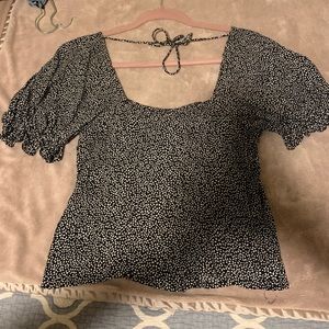 & other stories black blouse with tiny white flowers